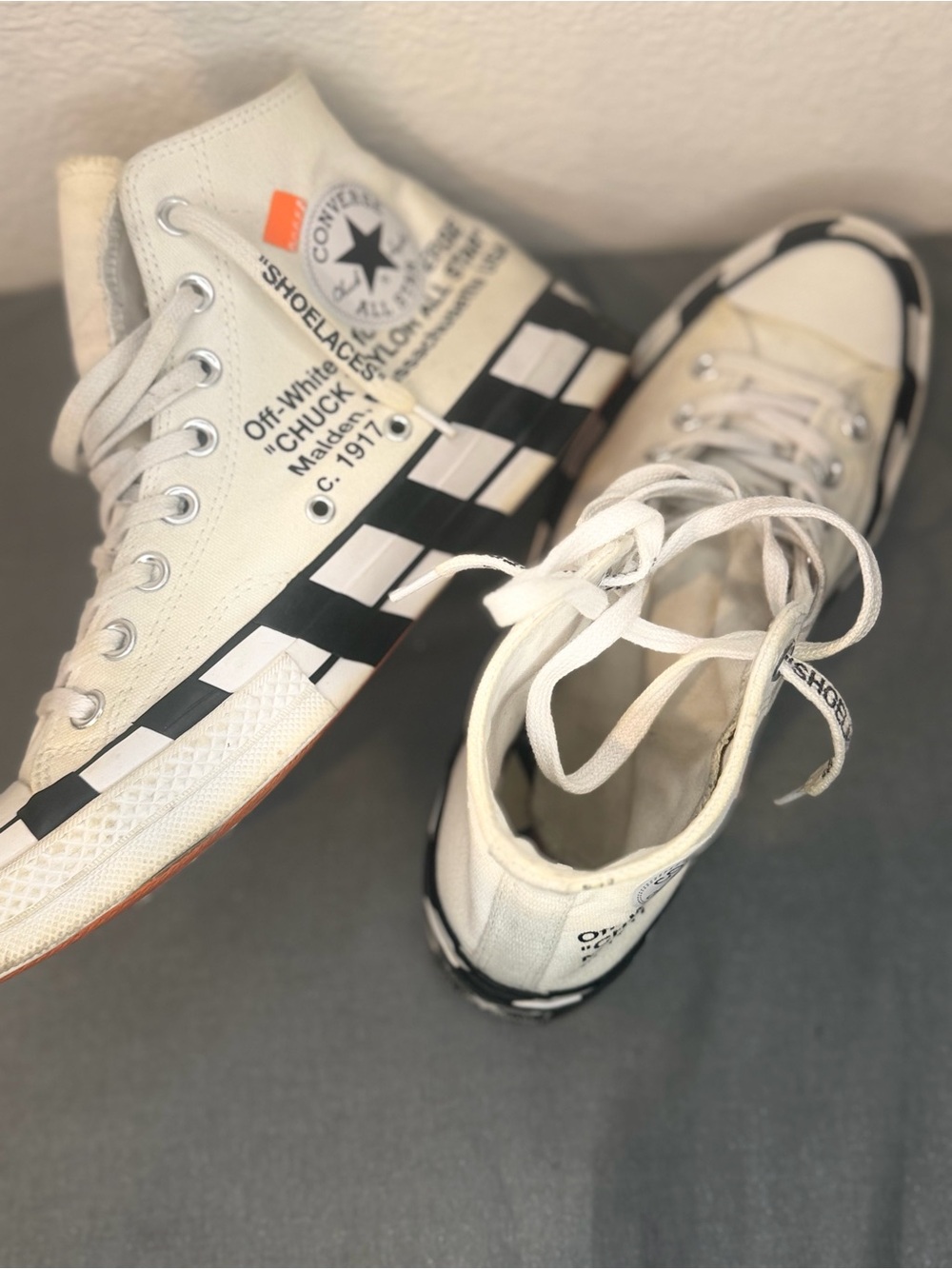 White Checkerboard High-Top Sneakers with Black Accents